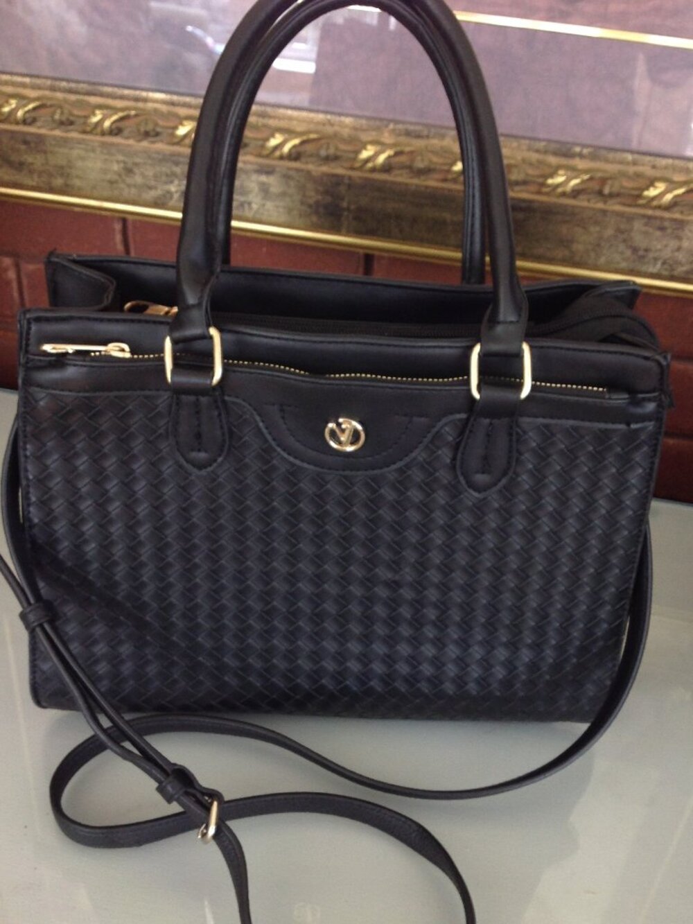 Black Leather Hand Bag/Shoulder Bag with initials CV Emblem on front